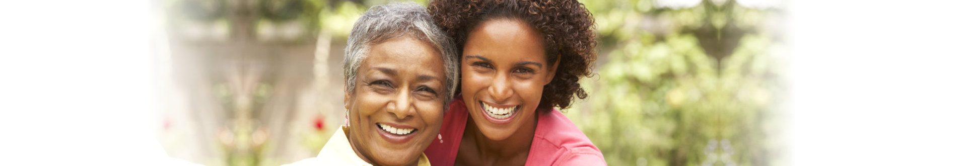 happy senior woman and daughter