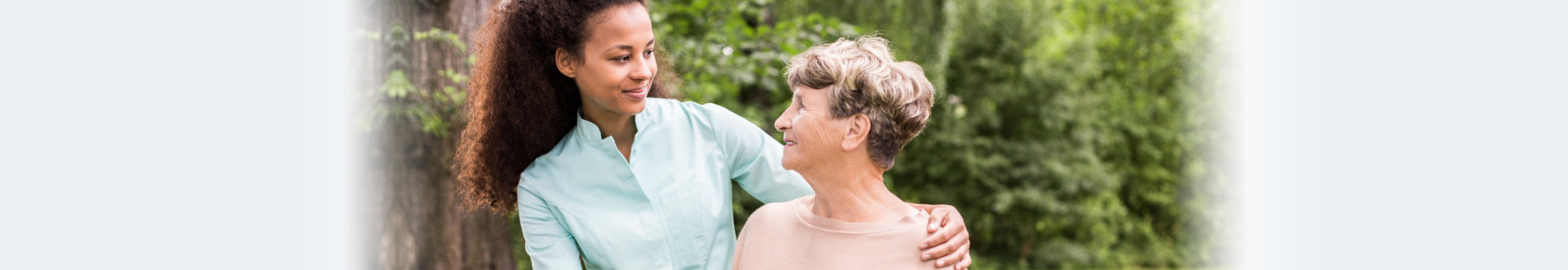 nurse and old lady smiling